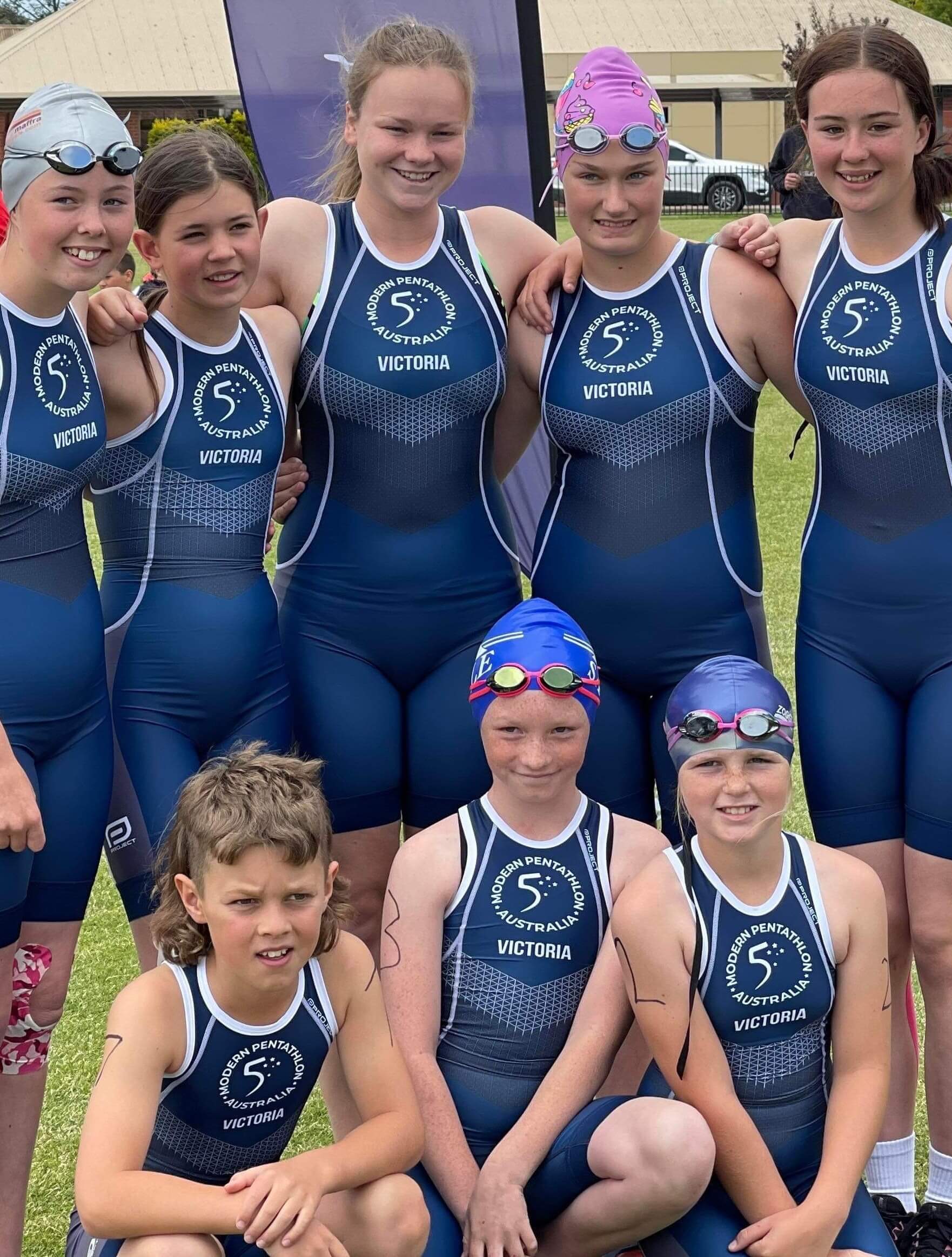 Victorian Triathle Competitors standing for photo